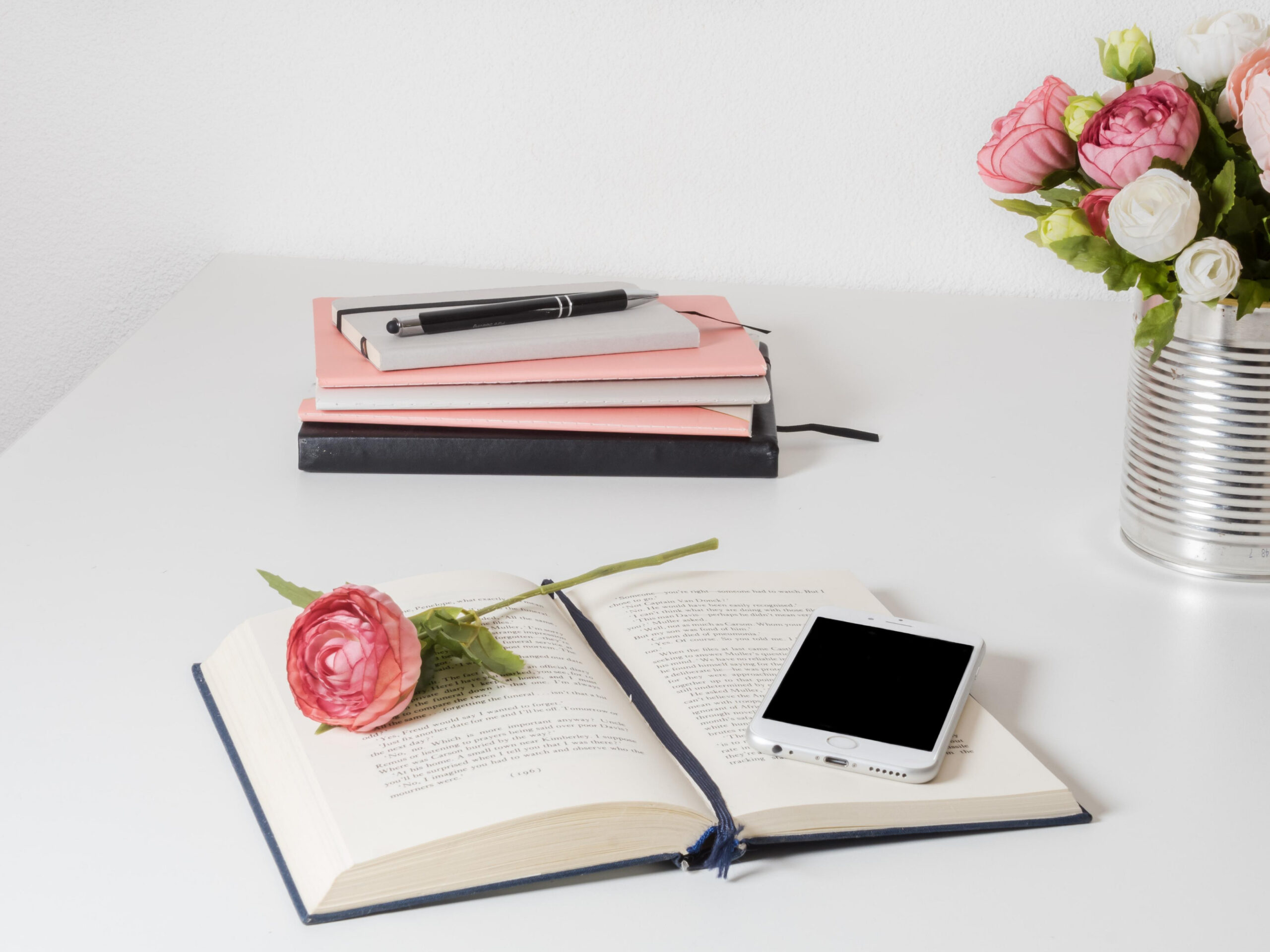 image of a phone and a book for Creative Writing and Freelance Projects
